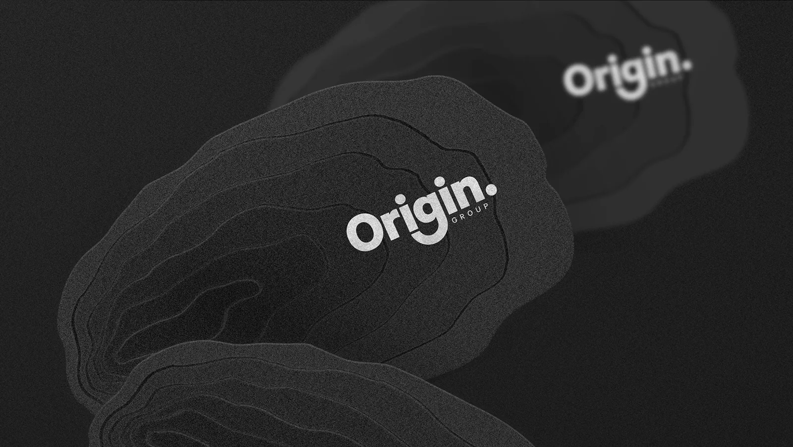 Origin brand identity shown on textured black cards